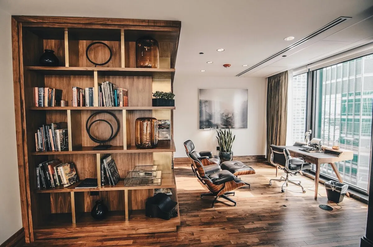 Modern home office created from a garage conversion - featuring designer furniture and natural light